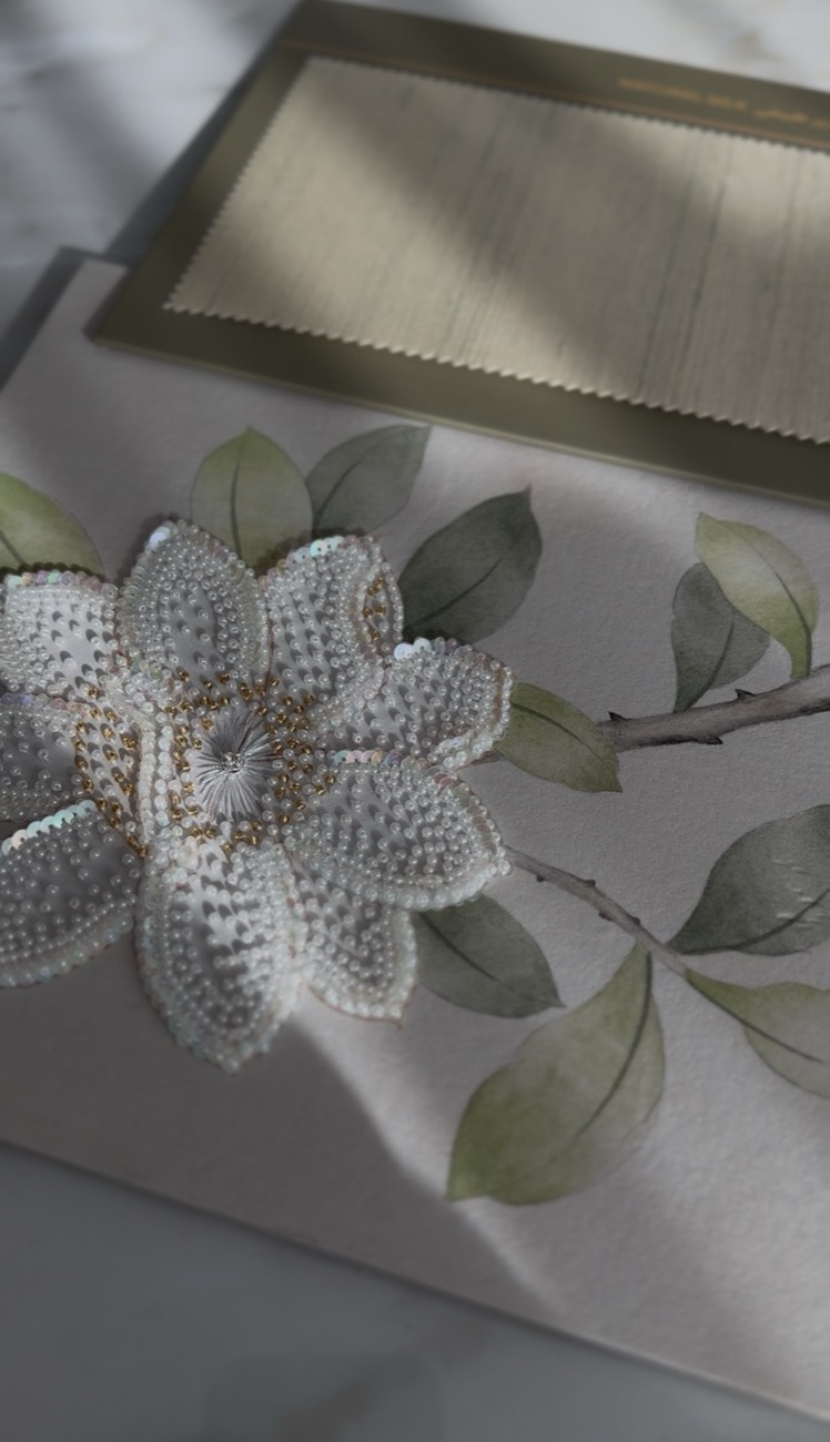 Hand-embroidered magnolia on hand-painted natural silk
